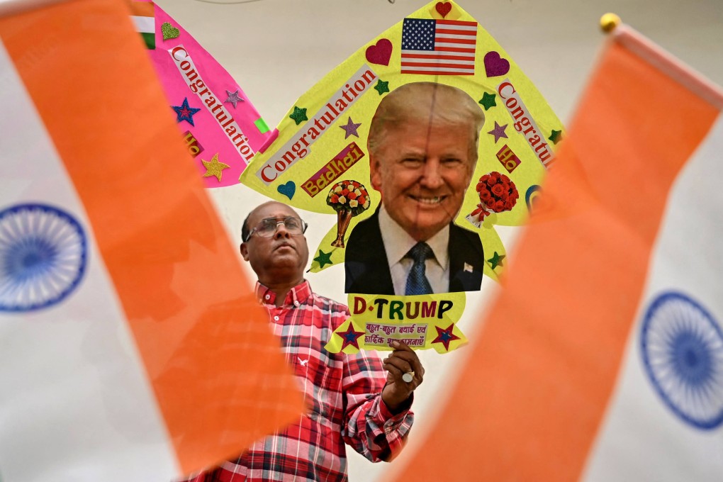 A kitemaker displays a kite decorated with an image of former US president and Republican presidential candidate Donald Trump in Amritsar, India, on Wednesday. Trump has won the US presidential election, according to US media. Photo: AFP