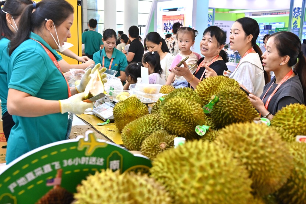 Women buy Malaysian durians at the China-Asean Expo in Nanning, Guangxi Zhuang autonomous region, in September. Photo: Xinhua