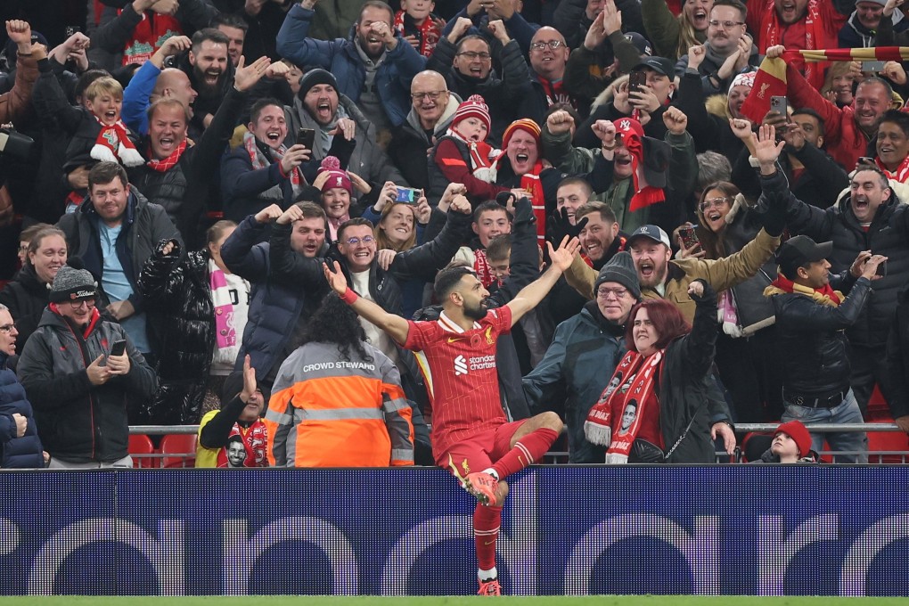 Liverpool’s Mohamed Salah celebrates after scoring his side’s second against Aston Villa at Anfield. Photo: EPA-EFE