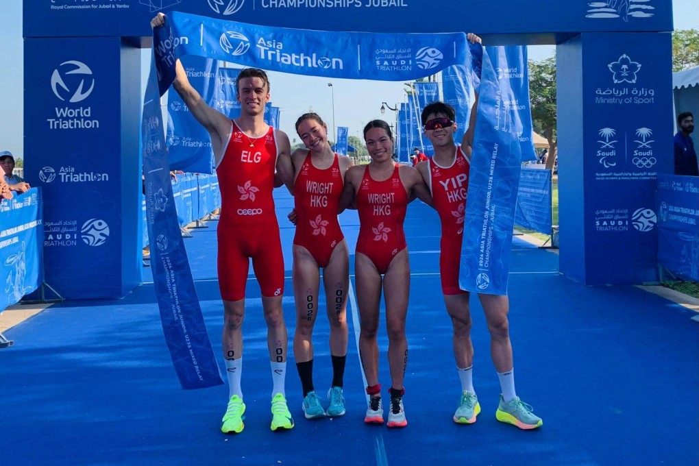 The triumphant Hong Kong quartet of Robin Elg, Tallulah Wright, Cade Wright and Yip Tak-long celebrate their mixed-relay gold in Saudi Arabia.