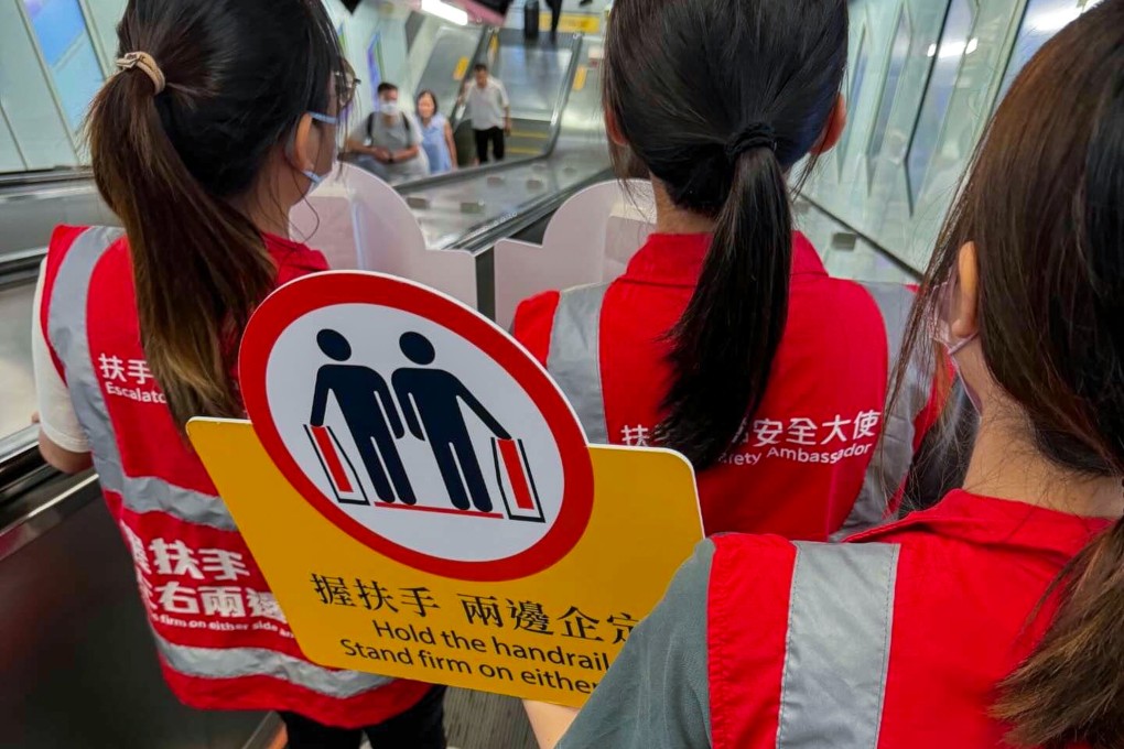 The MTR Corp’s safety ambassadors occupy both sides of the escalator in efforts to discourage commuters from walking on them. Photo: Facebook