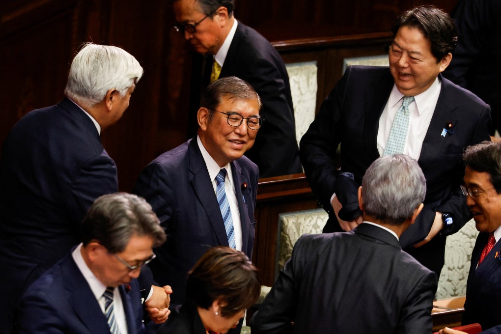 Japanese Prime Minister Shigeru Ishiba reacts after being re-elected as prime minister in parliament on Monday. Photo: Reuters