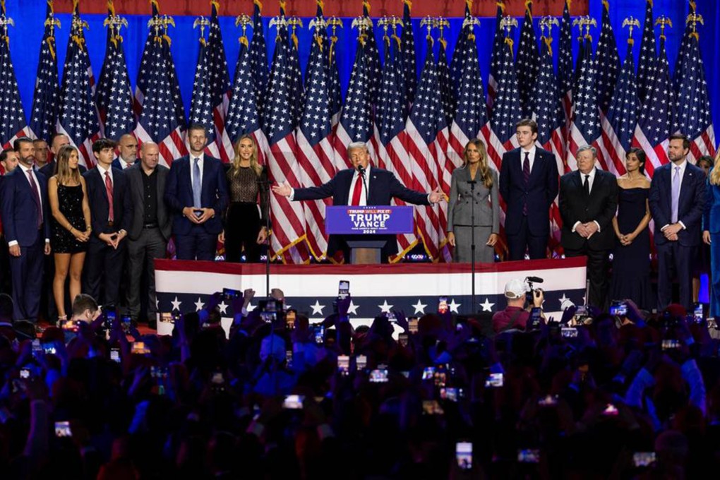 US Republican presidential nominee and former President Donald Trump speaks during his election night party flanked by family and friends at the Palm Beach County Convention Centre in West Palm Beach. Photo: dpa