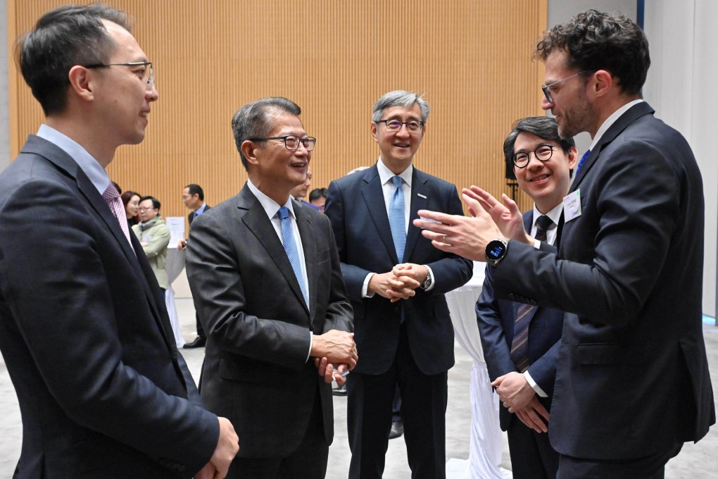 Financial Secretary Paul Chan (second from the left) attends the signing ceremony. Photo: Handout