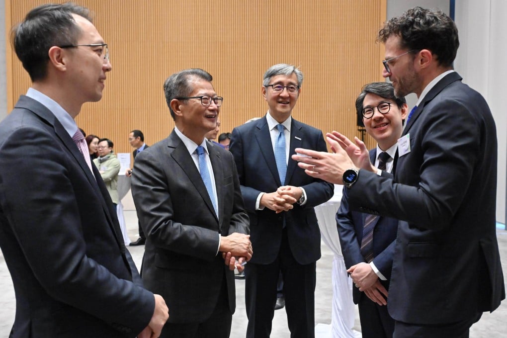 Financial Secretary Paul Chan (second from the left) attends the signing ceremony. Photo: Handout