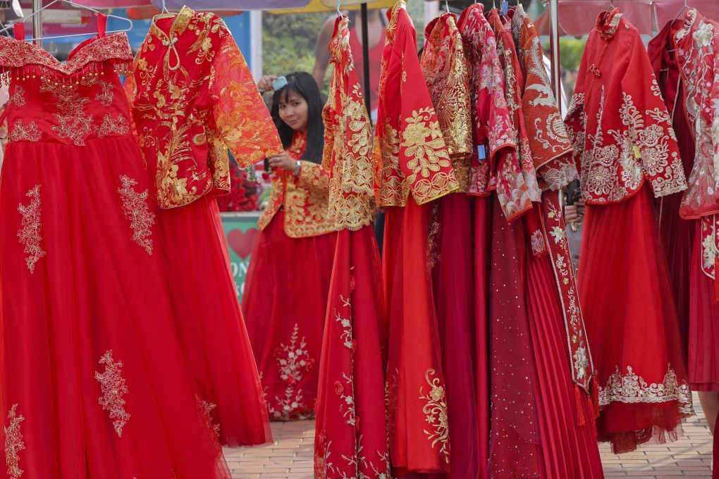 Qun kwa, a type of wedding dress worn in Hong Kong and other parts of southern China, comes in different grades based on how much of the red base fabric is covered with gold and silver embroidery. Photo: Jelly Tse