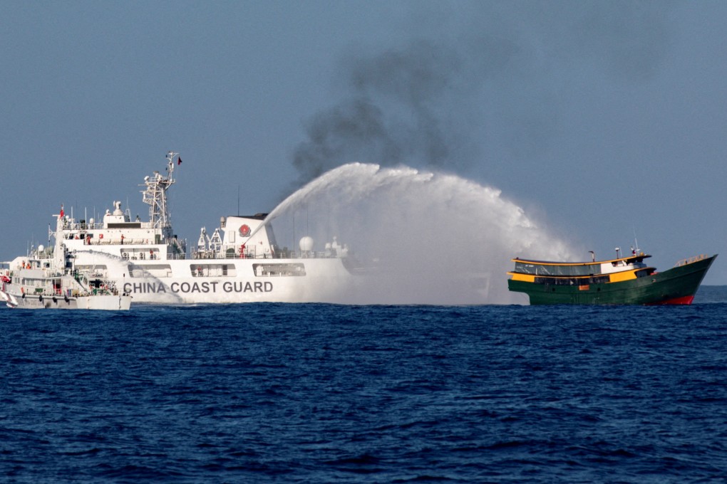Chinese Coastguard vessels fire water cannons towards a Philippine resupply ship in May. Photo: Reuters