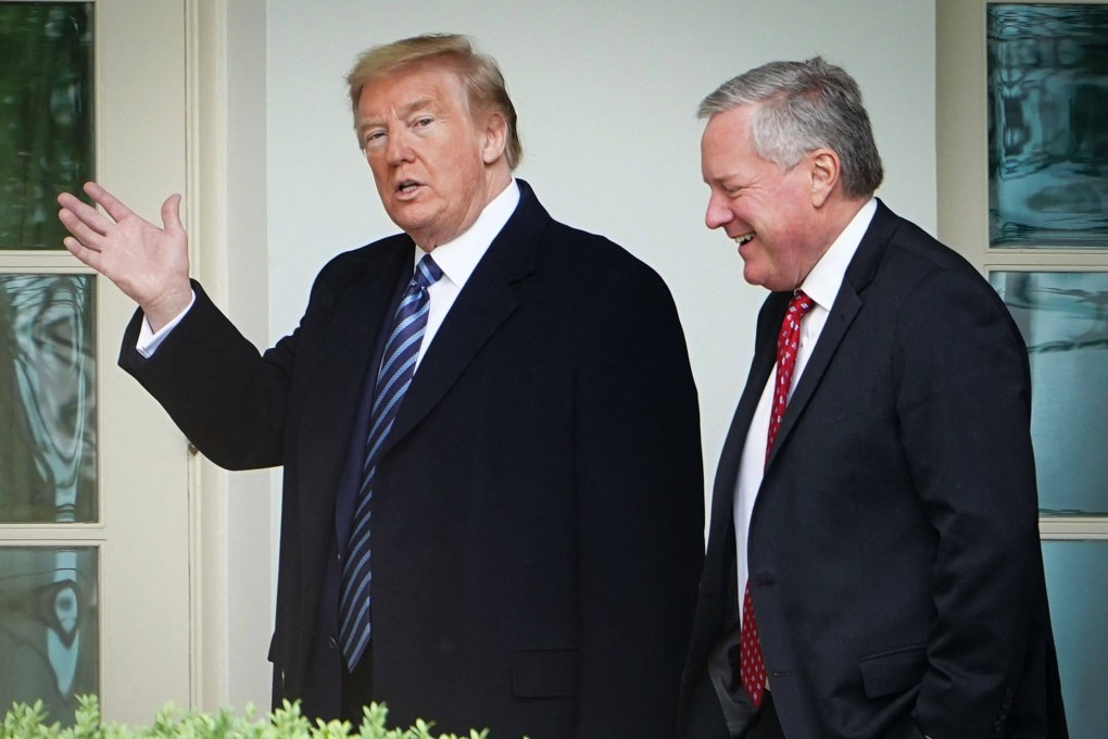 US President Donald Trump walks with Chief of Staff Mark Meadows in March 2020. Photo: AFP