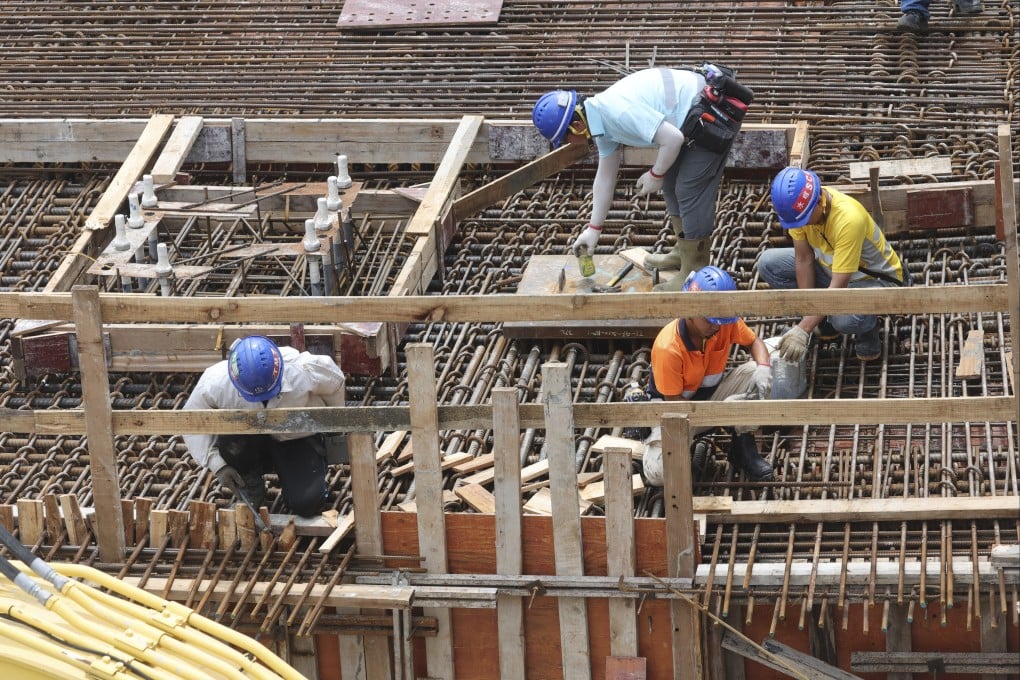A workers’ rights advocate says Hong Kong’s multilayered subcontracting system is also to blame for poor site safety. Photo: Edmond So