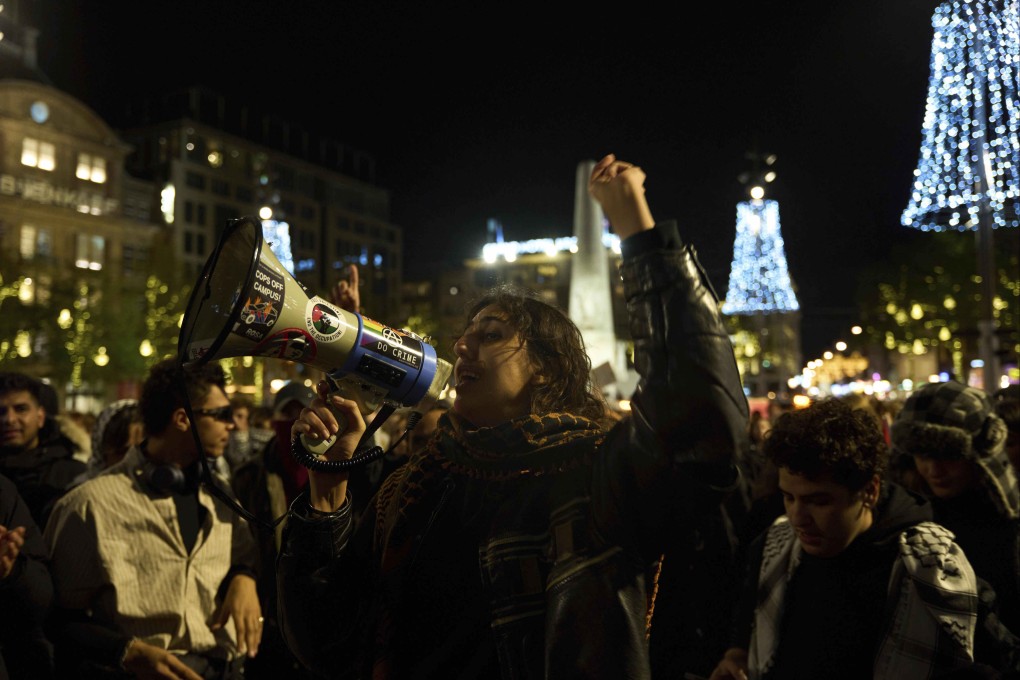 Pro-Palestinian supporters protest in Amsterdam despite a city ban on such gatherings. Photo: AP