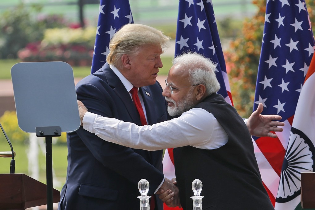 Then-US President Donald Trump and Indian Prime Minister Narendra Modi embrace after giving a joint statement in New Delhi on February 25, 2020. Photo: AP