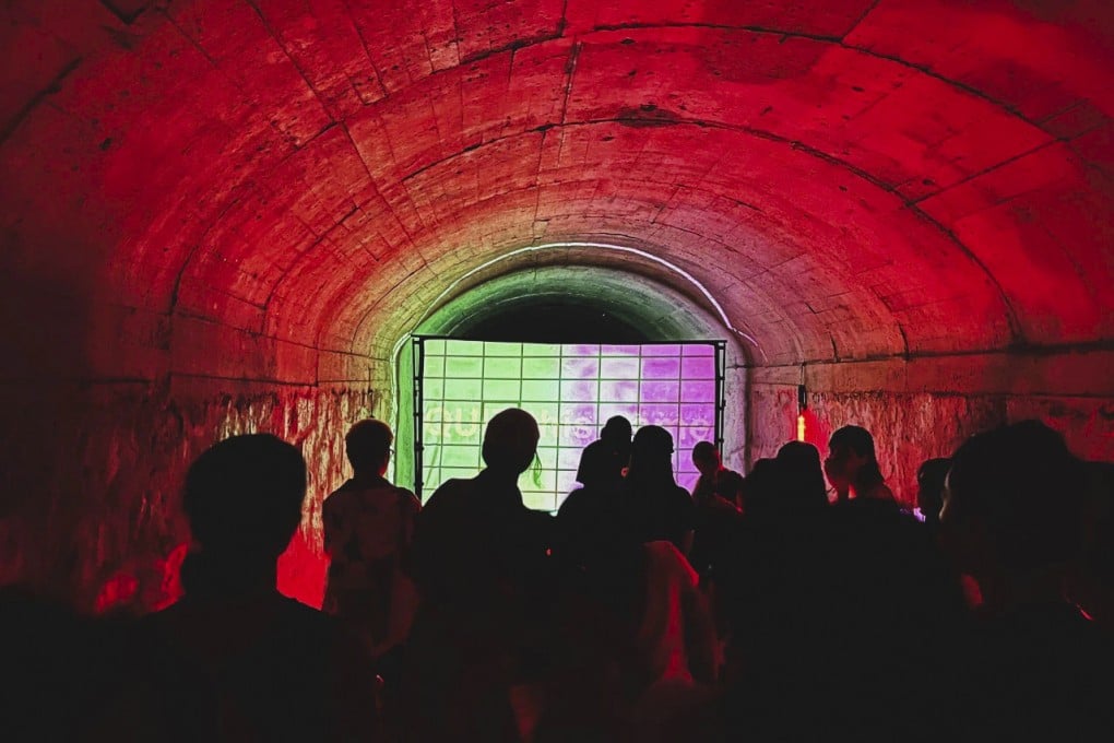 Ravers dance in an abandoned air raid shelter in Guangzhou, China. Underground raves are growing in popularity in the country. Photo: AP