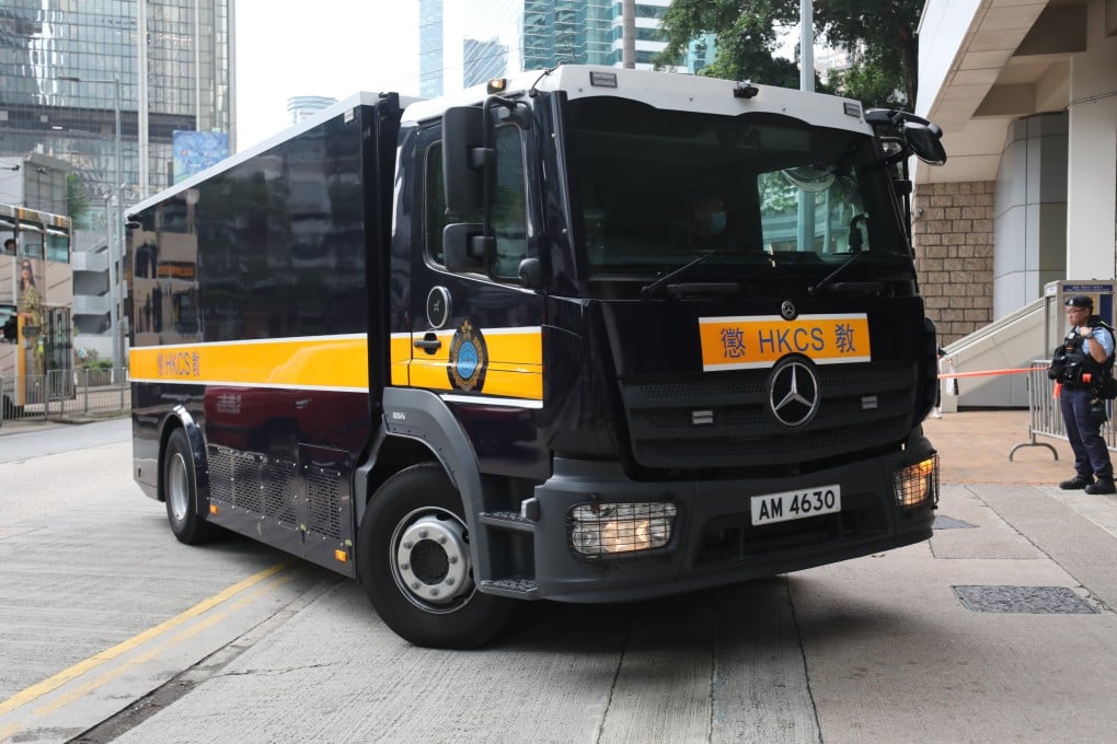 A prison vehicle brings members of the “Dragon Slaying Brigade” to the High Court during earlier proceedings. Photo: Xiaomei Chen