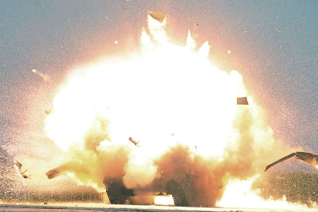 A target explodes during a drone test overseen by North Korean leader Kim Jong-un at an undisclosed location in August. Photo: KCNA via Reuters