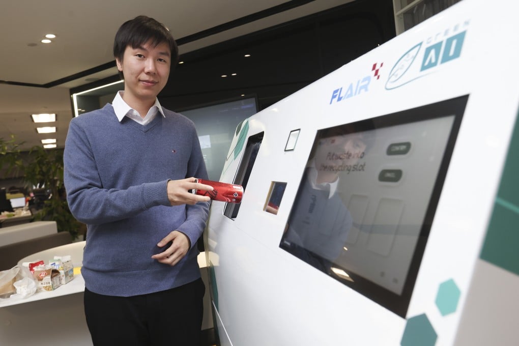 Cola Lam, CEO of Green Al Technology, gives a demonstration of the smart sorting bin at the company’s offices at Hong Kong Science Park in Sha Tin. Photo: Edmond So