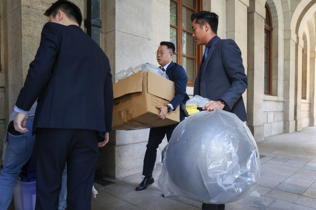 Evidence in the yoga ball murder case is taken away following previous legal proceedings. Photo: Dickson Lee