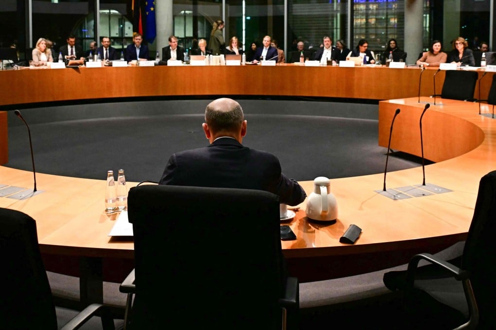 German Chancellor Olaf Scholz (front centre) is pictured ahead of testifying before a committee at the Bundestag in Berlin on November 14. Photo: AFP