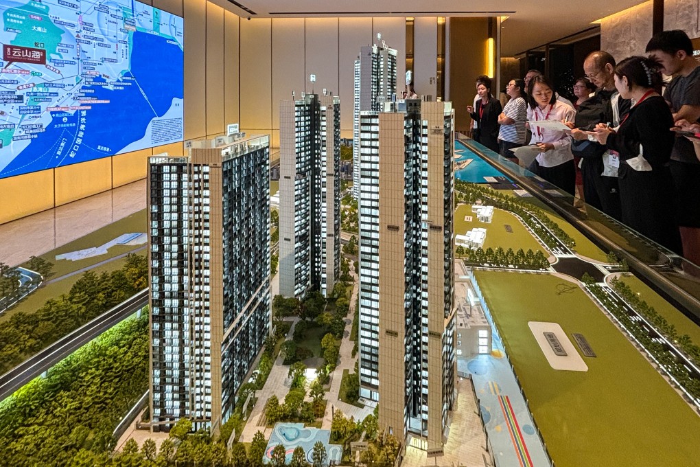 Homebuyers seen inside a property showroom in Nanshan district, Shenzhen on October 3. Photo: Yulu Ao