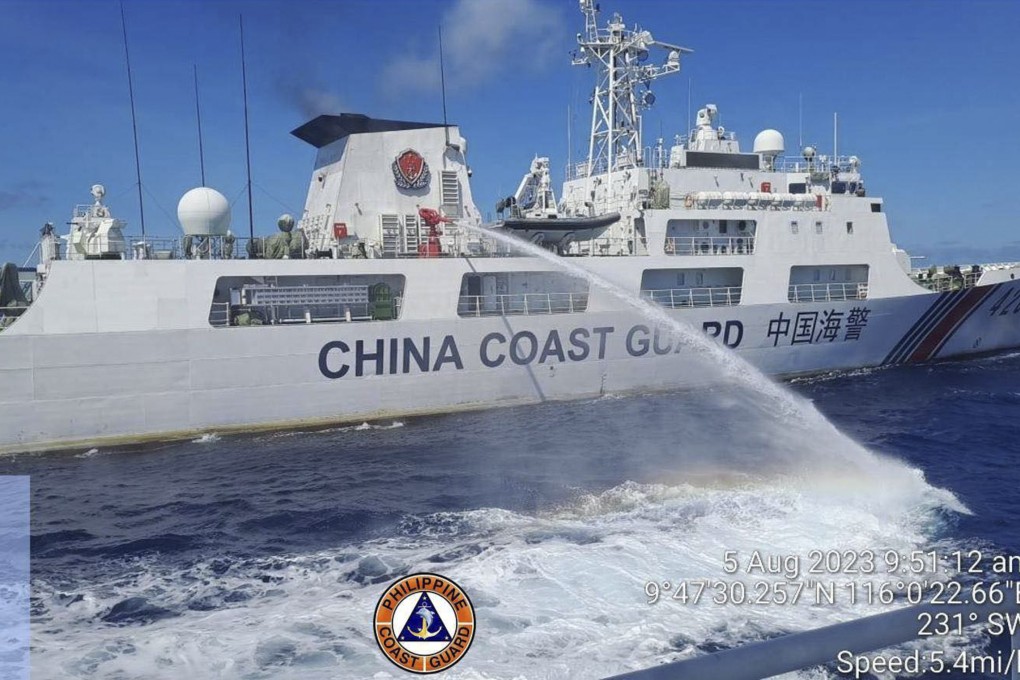 Military expert Zhou Bo says that despite frequent clashes between Beijing and Manila, a dispute between the two could be resolved. Photo: Philippine Coast Guard via AP