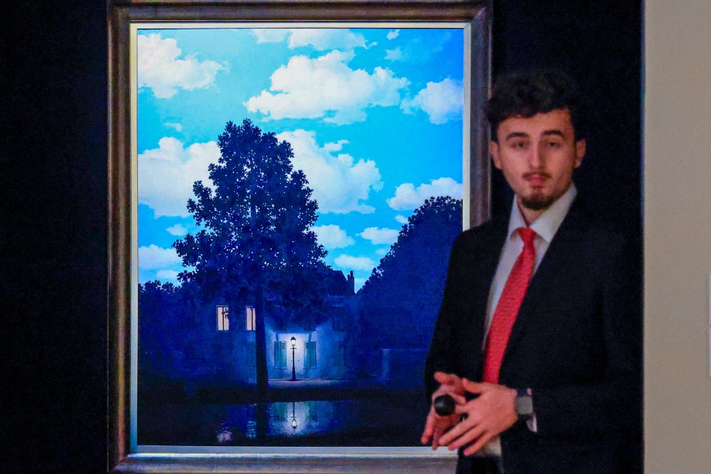One of Rene Magritte’s Empire of Light paintings from 1954 is displayed during a preview for a November 19 Christie’s auction in New York. Photo: AFP