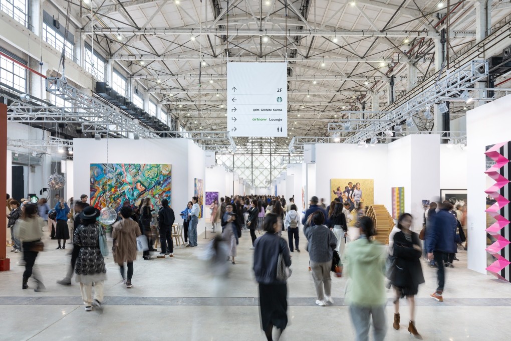 Visitors view works on show at the West Bund Art and Design Fair, part of Shanghai Art Week 2024. Photo: courtesy of West Bund