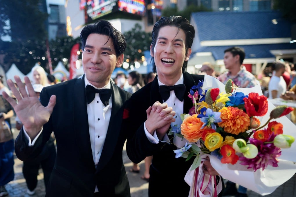 Couple Apiwat Porsch Apiwatsayree, 48, and Sappanyoo Arm Panatkool, 37, attend a Pride parade to celebrate after Thailand’s passing of the marriage equality bill. Wedding planners say it could help make it a top LGBTQ wedding destination. Photo: Reuters