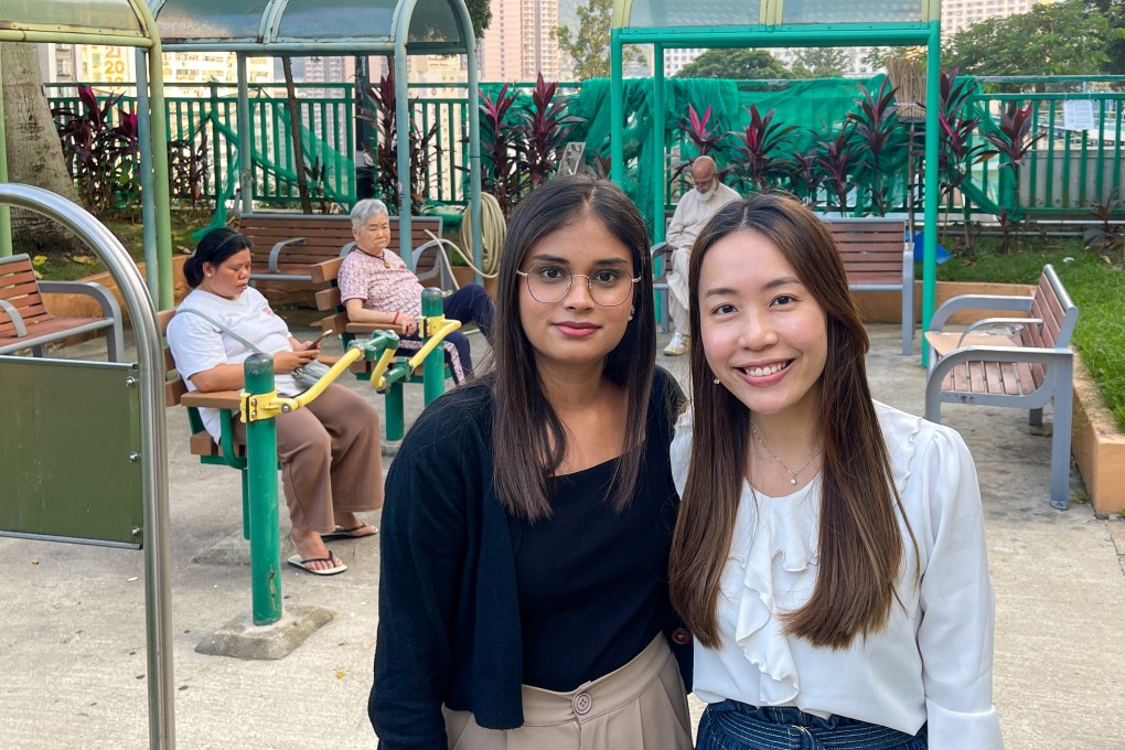 Kaur Kirandeep (left) and Emily Yeung help elderly people from ethnic minority groups in Hong Kong feel more connected to their neighbours. Photo: Cindy Sui