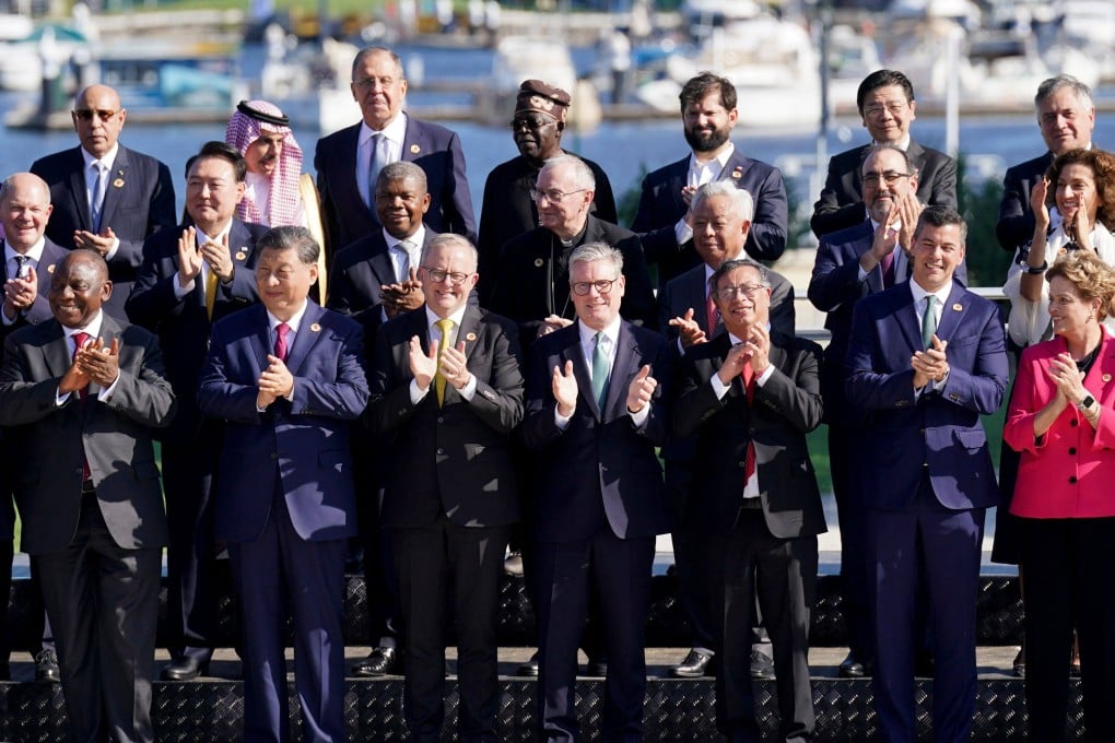 Global leaders attending the G20 summit in Rio de Janeiro, Brazil, pose for a group photo at the end of the first session on November 18, 2024. Photo: AFP