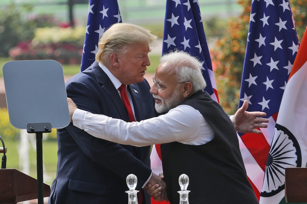 Donald Trump, left, and Indian Prime Minister Narendra Modi embrace after giving a joint statement in New Delhi, India back in 2020. Photo: AP