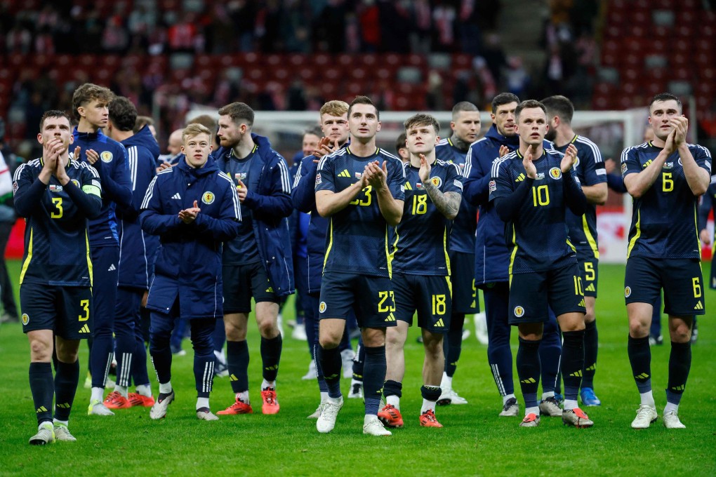 Scotland’s players celebrate as their last-gasp win in Poland gives them a League A reprieve as they now face a play-off to avoid relegation. Photo: AFP