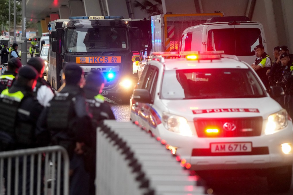 The defendants head back to jail in a prison vehicle.  Photo: Sam Tsang