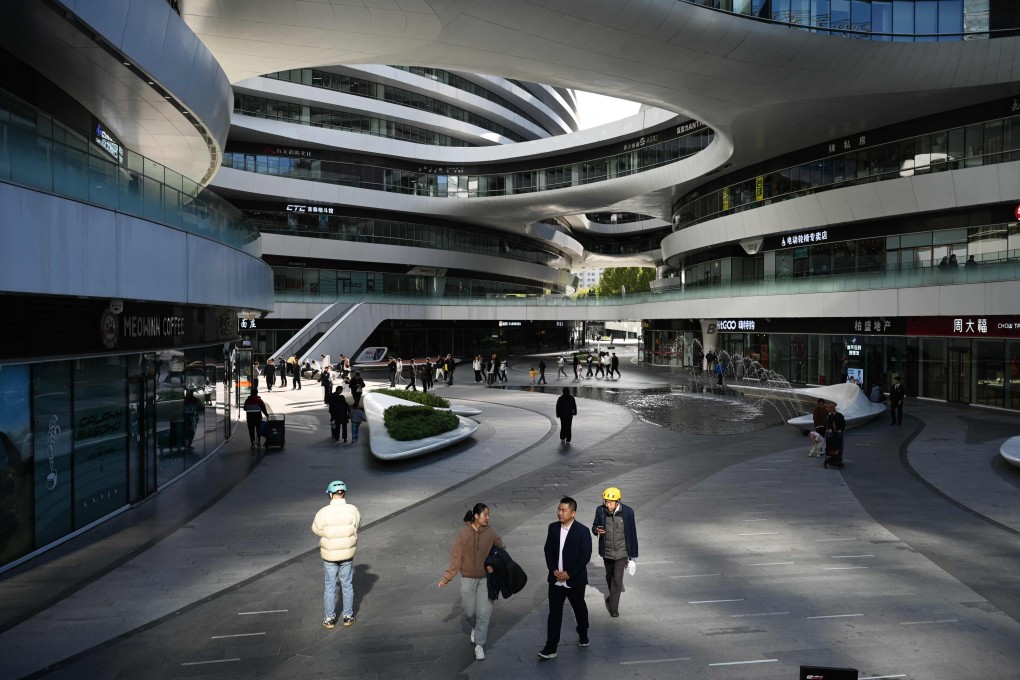 Afternoon foot traffic is slow at a shopping complex in Beijing on November 3. Photo: AFP