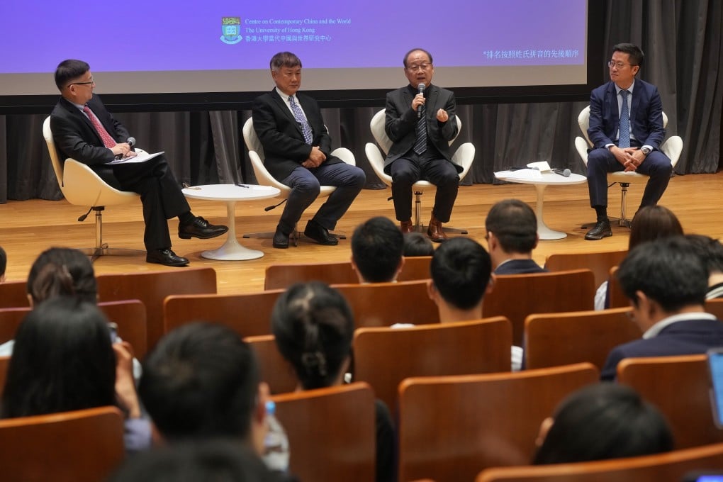 Chinese economist Zhang Ming, right, has warned against letting security outweigh development as Beijing plans for the future of its relationship with the US under the second term of Donald Trump. Photo: Elson Li