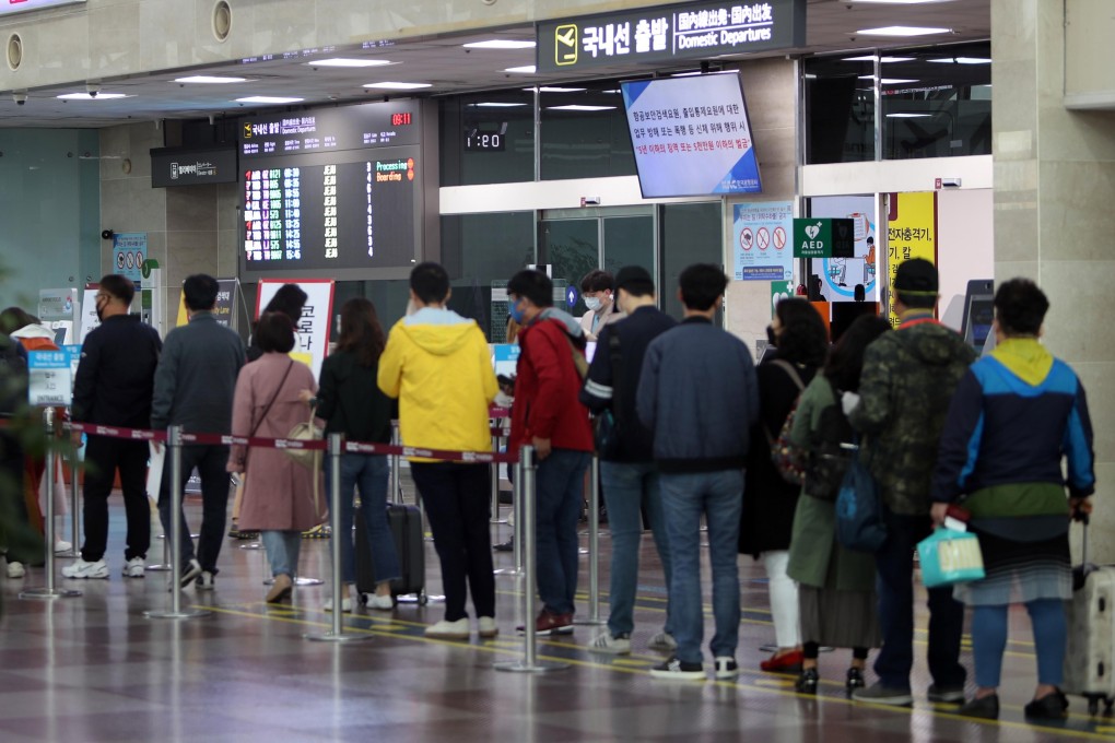 Tourists check in at Daegu International Airport in South Korea. Photo: EPA-EFE/Yonhap