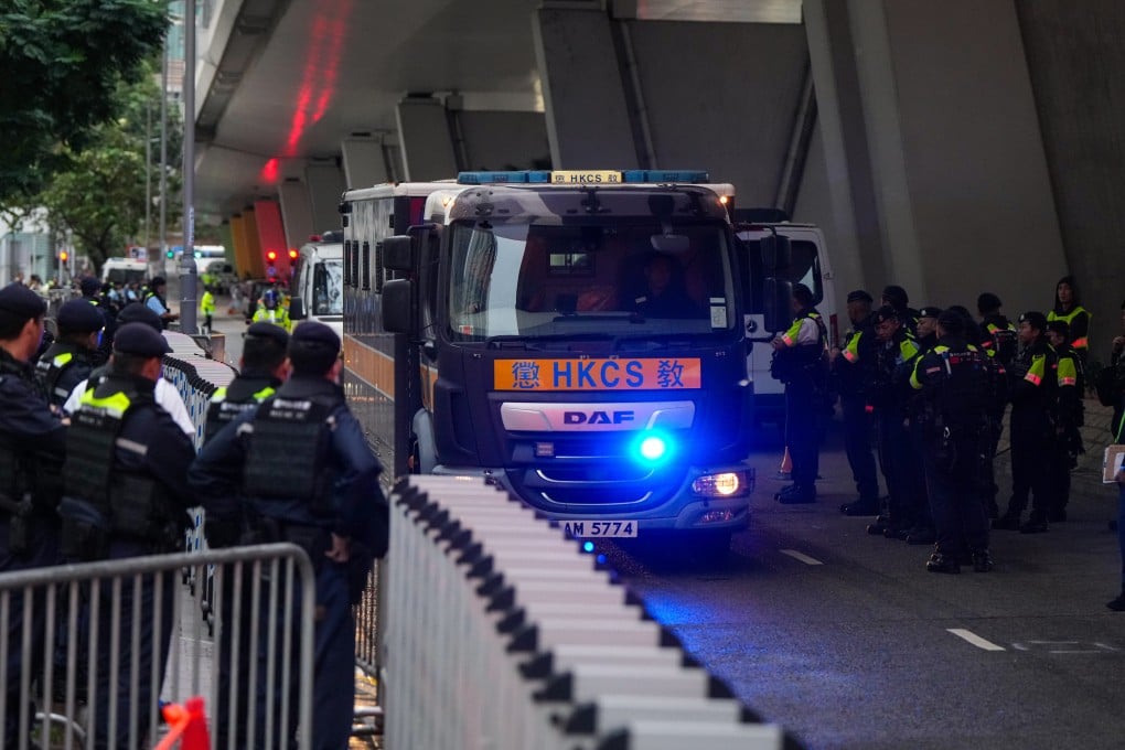 The jailed opposition activists and politicians are taken back to prison after sentencing on Monday. Photo: Sam Tsang