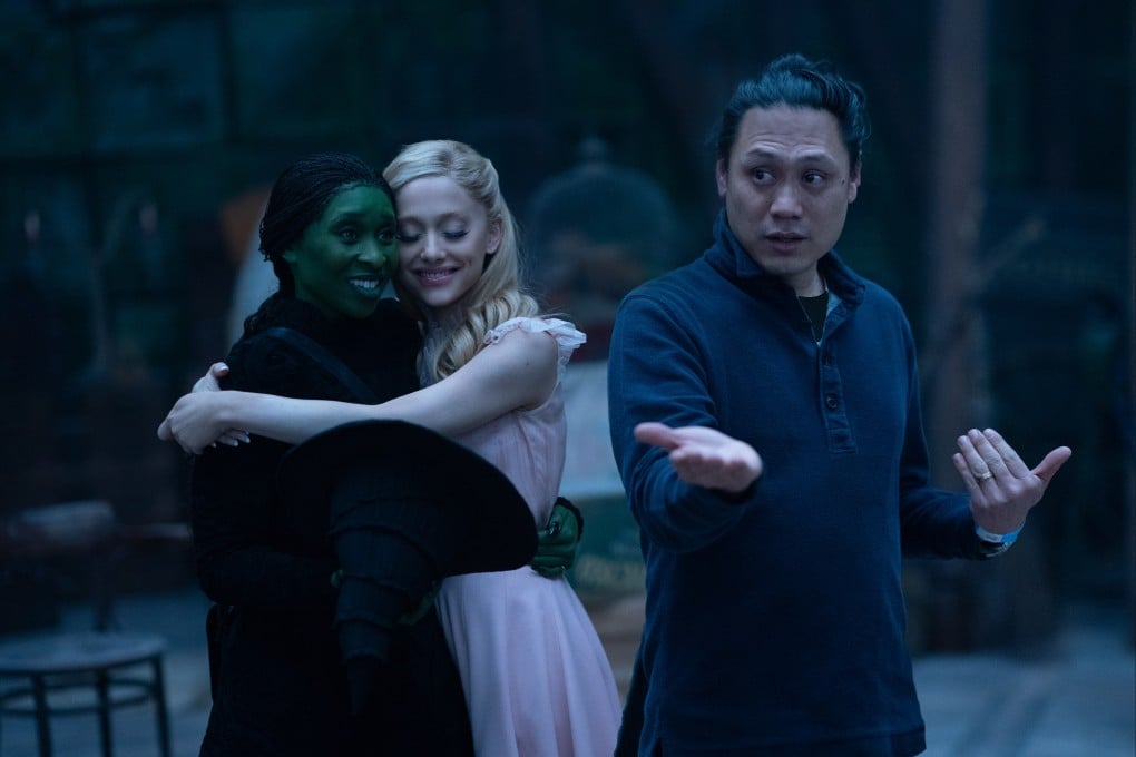 (From left) Cynthia Erivo, Ariana Grande-Butera and director Jon M. Chu on the set of Wicked. We rank this and nine other of Chu’s films. Photo: Universal Pictures