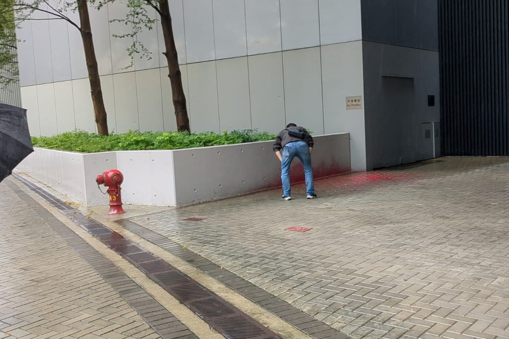 Security personnel discovered the paint splashed near a flower bed at an entrance of the headquarters close to Harcourt Road on Wednesday morning. Photo: Handout