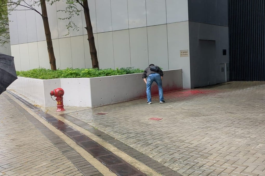 Security personnel discovered the paint splashed near a flower bed at an entrance of the headquarters close to Harcourt Road on Wednesday morning. Photo: Handout