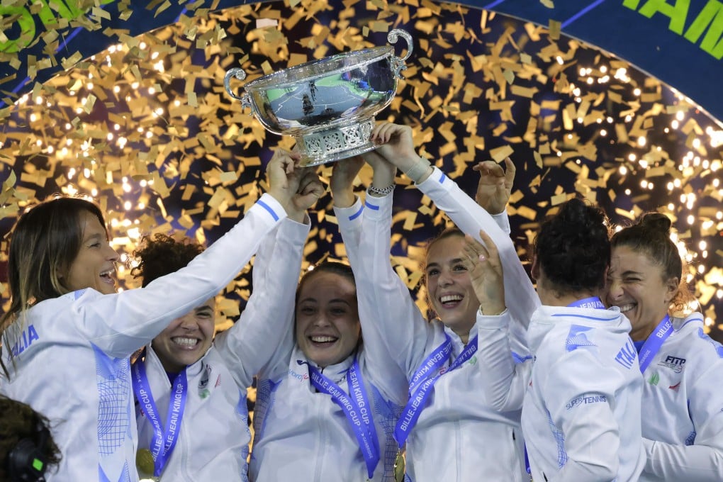 Italy’s players celebrate after winning the BJK Cup with victory over Slovakia in the final. Photo: Reuters