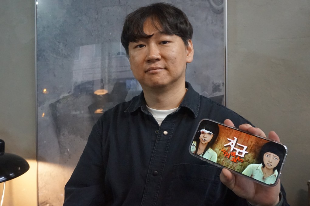 Joo Dong-geun with his debut webtoon “All of Us are Dead”. Photo: David D. Lee