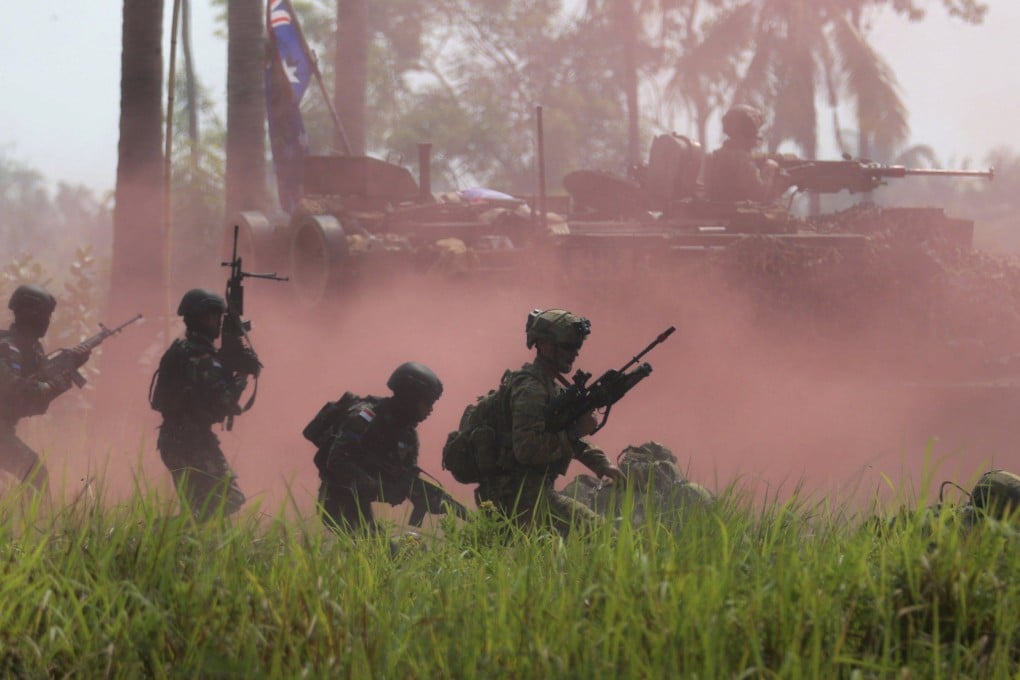 Australian soldiers conduct joint manoeuvres with Indonesian marines during an amphibious landing exercise on November 13. Photo: AP