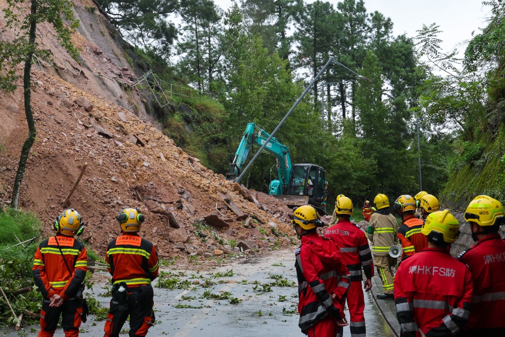 Workers deal with a Tai Po   landslide on Bride’s Pool Road near Wu Kau Tang in September. Photo: Dickson Lee