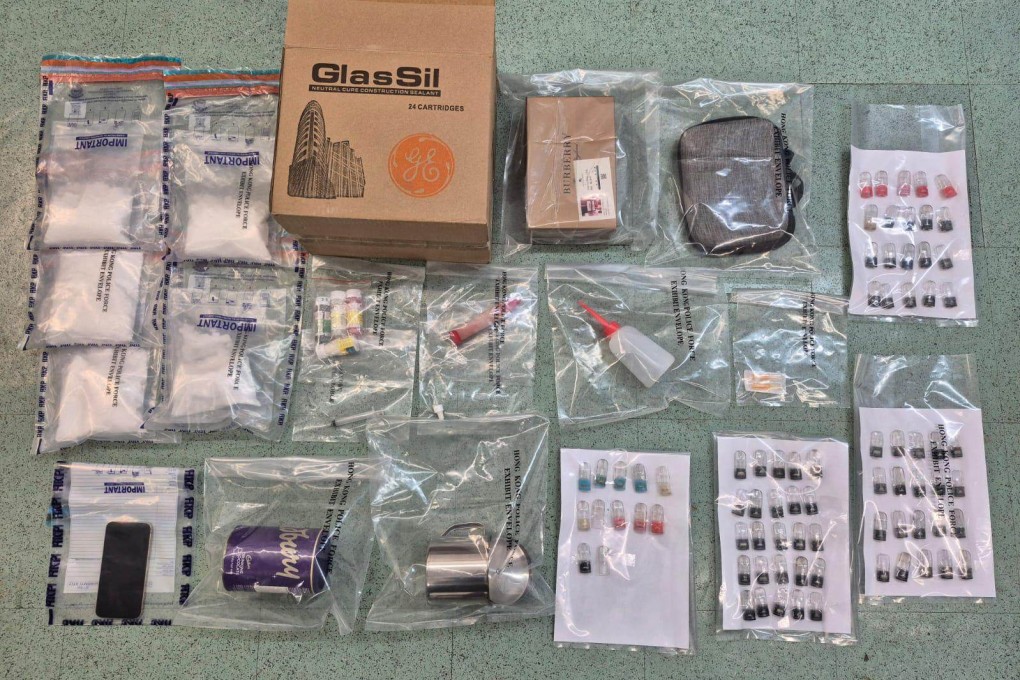 Police seized a cardboard box containing 1.67kg of suspected etomidate powder and relevant tools in one operation. Photo: Handout
