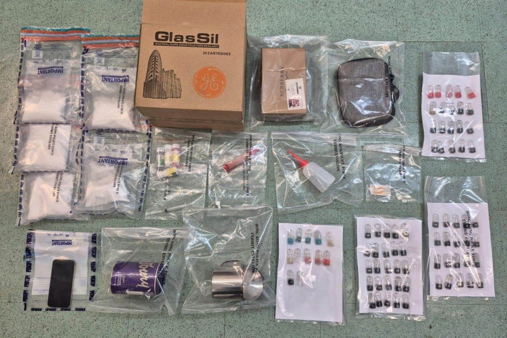 Police seized a cardboard box containing 1.67kg of suspected etomidate powder and relevant tools in one operation. Photo: Handout