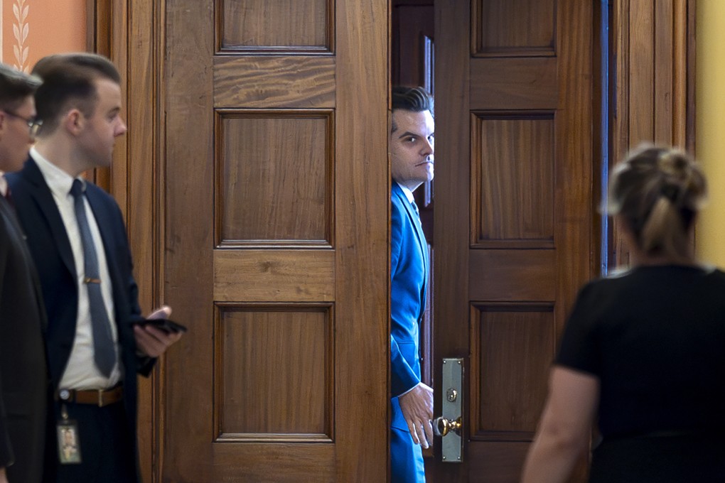 Matt Gaetz closes a door to a private meeting with Vice-President-elect J.D. Vance and Republican Senate Judiciary Committee members, at the Capitol in Washington, on Wednesday. Photo: AP