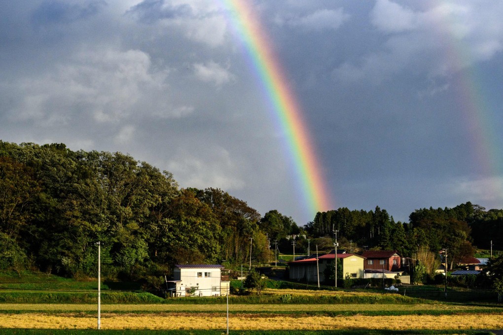 A rainbow is seen through a Tohoku Shinkansen train window, near Koriyama station in Fukushima on October 30. Photo: AFP