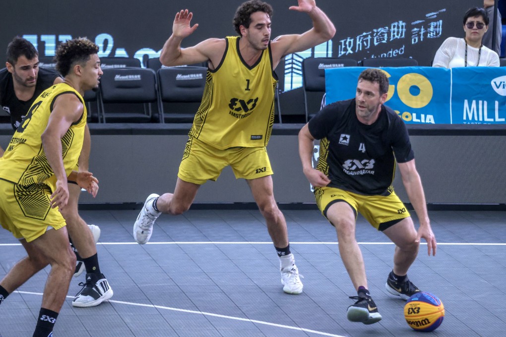 Steve Sir (right) hit a winner at the buzzer for Ulaanbaatar MMC Energy in their game against Amsterdam. Photo: Jonathan Wong