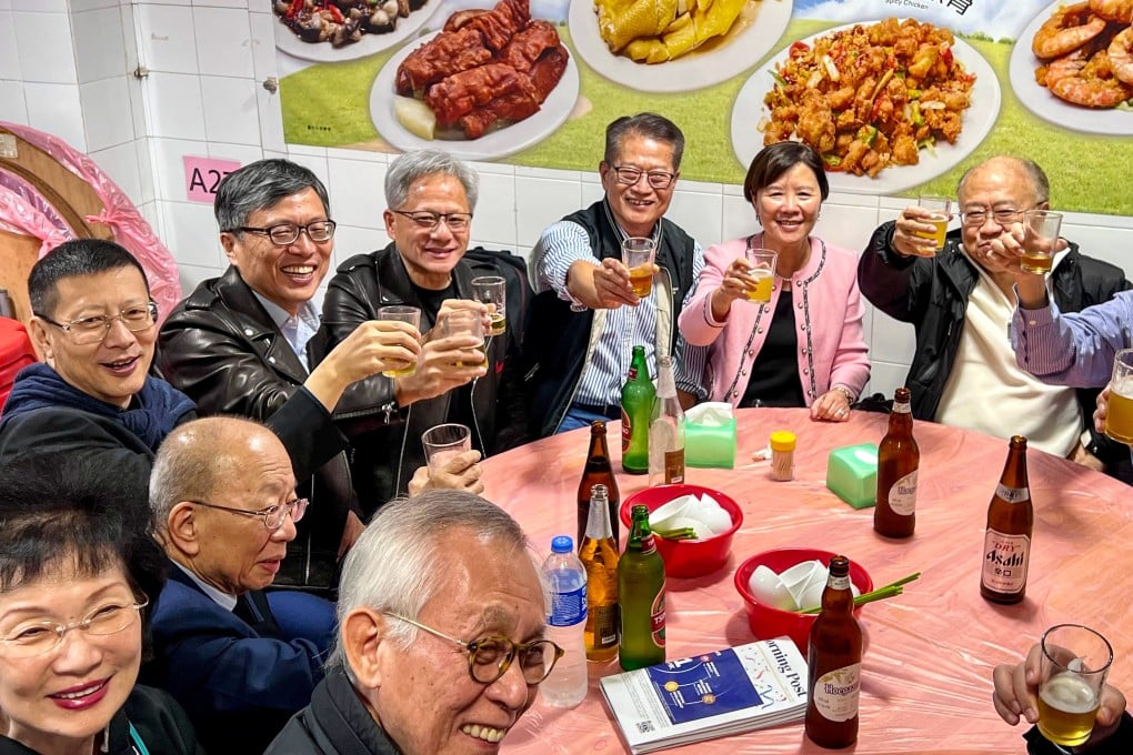Financial Secretary Paul Chan (fourth from right) seated between Nvidia founder Jensen Huang and HKUST president Nancy Ip, among other I&T sector heavyweights. Photo: FS blog