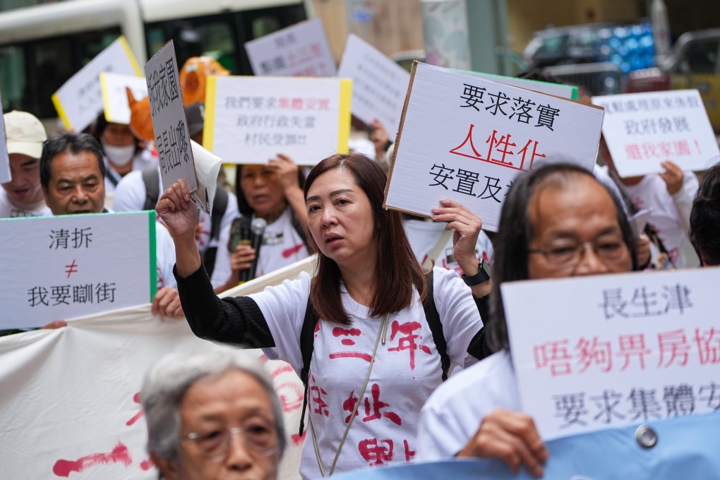 Villagers from the Hung Shui Kiu area near the border march in Admiralty on Sunday. Photo: Eugene Lee
