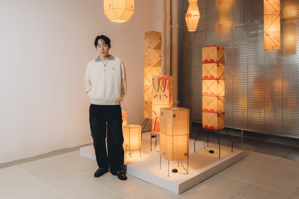 Korean artist Gyuhan Lee in front of an artwork as part of his solo exhibition, “Pop Craft Structure”, at WOAW Gallery in Hong Kong. Photo: Jocelyn Tam